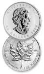 silver maple leaf coin and silver dollar with the face of the queen Elizabeth