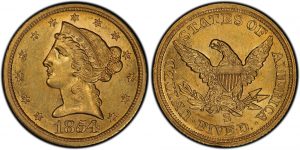 ancient gold liberty head coin with american eagle on the other side