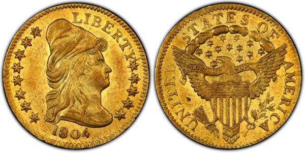 gold liberty head coin with american eagle