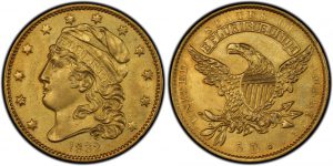 gold coin with liberty head and american eagle on opposite sides