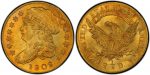 gold coin with liberty head and american eagle on opposite sides