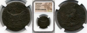 close up to two sides of ancient roman coins in the packaging