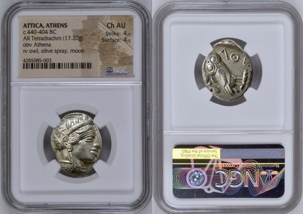 two sides of ancient roman coins in the packaging