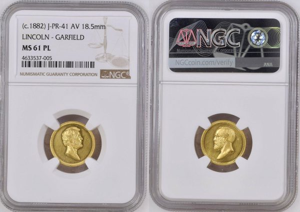 gold coin with lincoln on one side and garfield on another