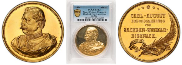 gold medal in the packaging from rare coins collection